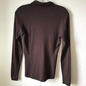 Smart wool under layer. 15.5”, pit to pit, flat. 15” flat at bottom.